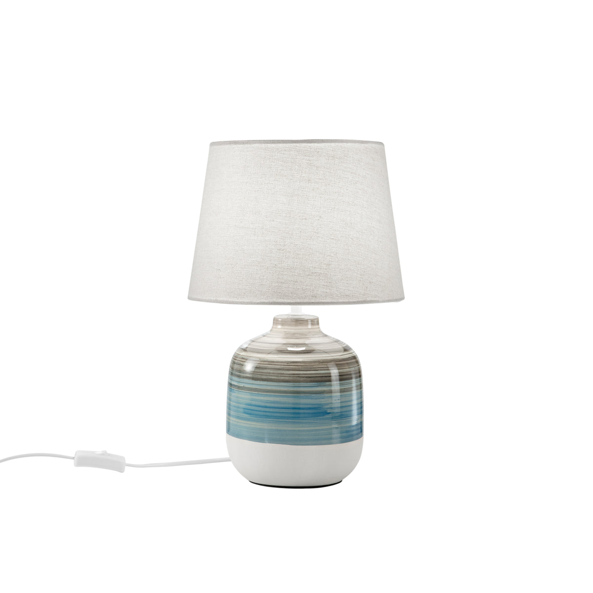 "Lume APACHE con base in ceramica e paralume in tessuto bianco."