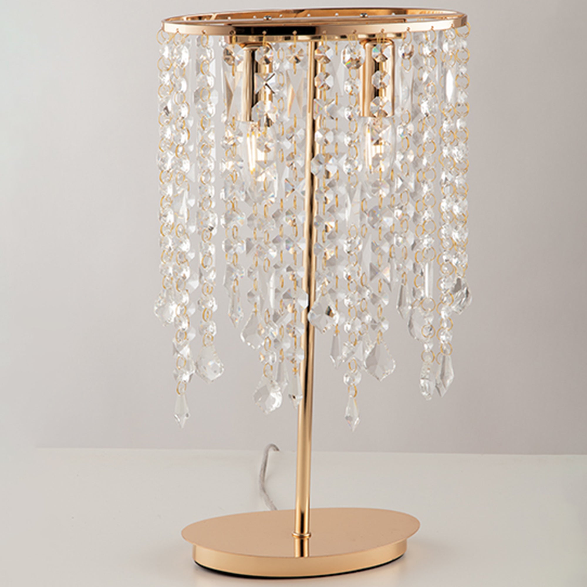 "Lampada da tavolo BREEZE in metallo oro con pendenti in cristallo"