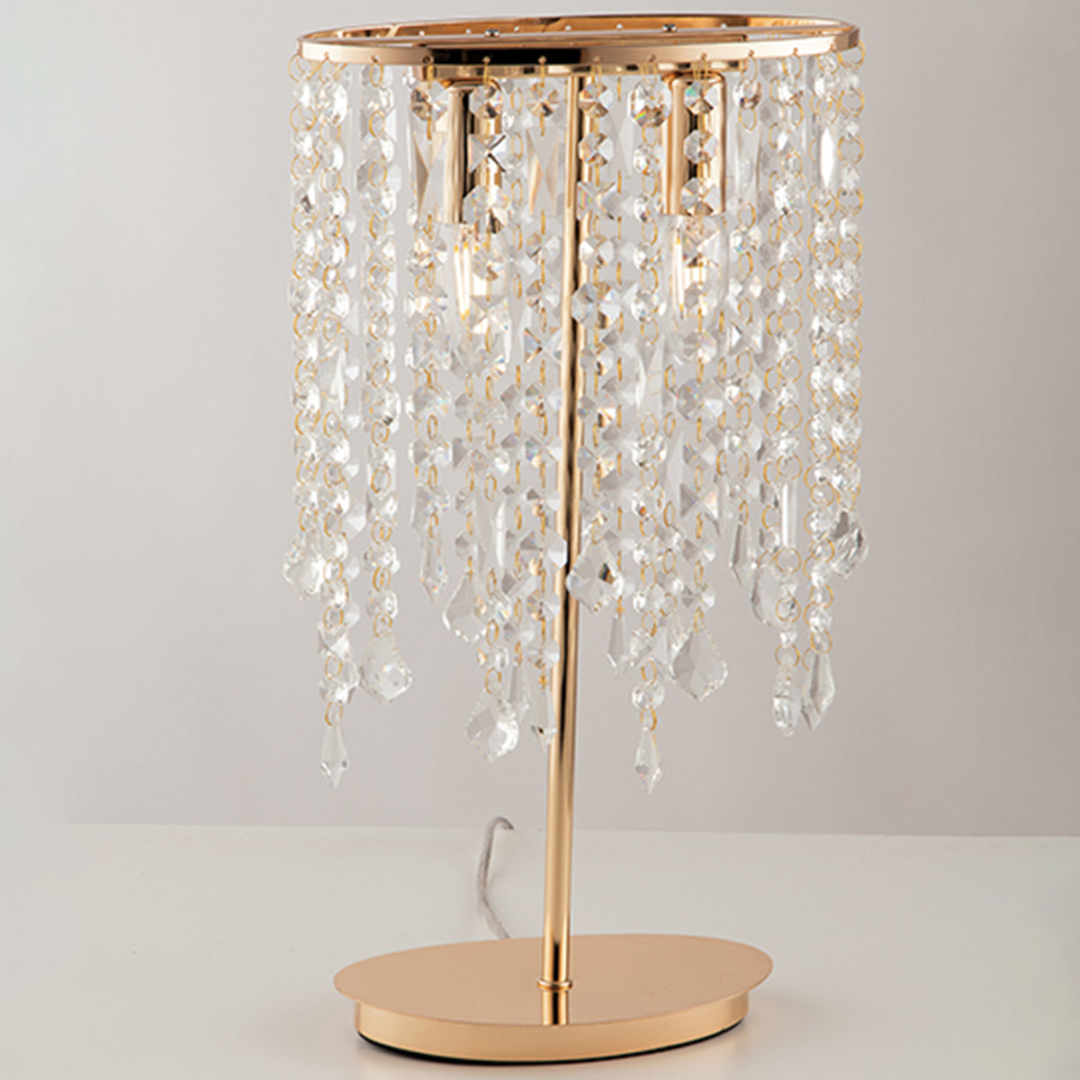 "Lampada da tavolo BREEZE in metallo oro con pendenti in cristallo"
