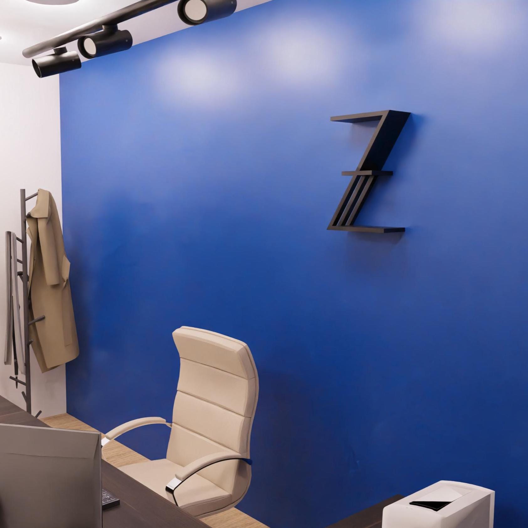 mensola in legno a forma di lettera Z colore nero sulla parete di un ufficio